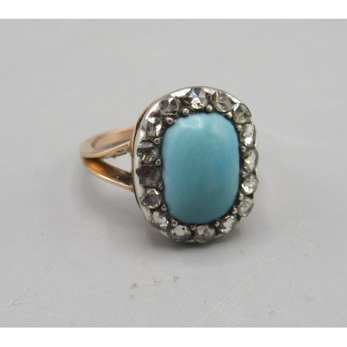 208 - Edwardian rose coloured metal ring set with central cabochon turquoise surrounded by diamonds, L1/2,... 