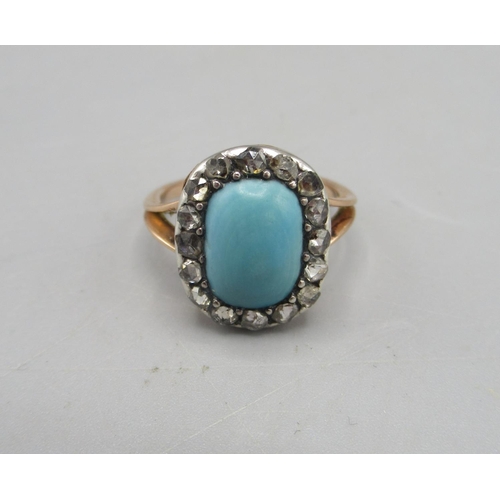 208 - Edwardian rose coloured metal ring set with central cabochon turquoise surrounded by diamonds, L1/2,... 