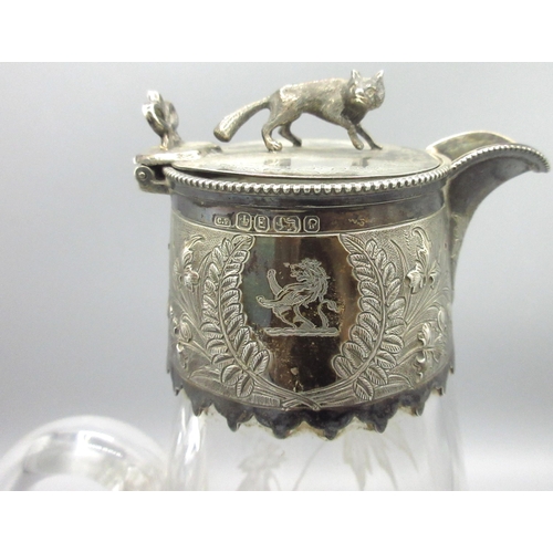 196 - Victorian cut glass claret jug engraved with a swan in a tropical scene, silver mount engraved with ... 