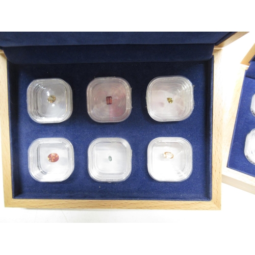 1092 - Two boxes of gem collector cut unmounted gemstones, including 1.52ct Imperial Topaz, 31.58ct Alto Ur... 