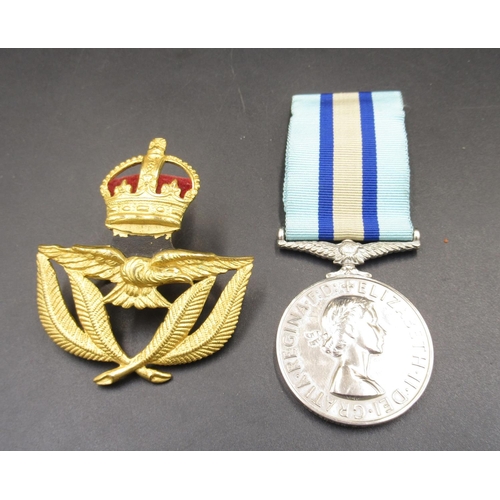 669 - Royal Observer's Corp Medal.  To Observer G.W. Thurman.  RAF Warrant Officer's Cap badge