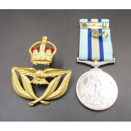 669 - Royal Observer's Corp Medal.  To Observer G.W. Thurman.  RAF Warrant Officer's Cap badge