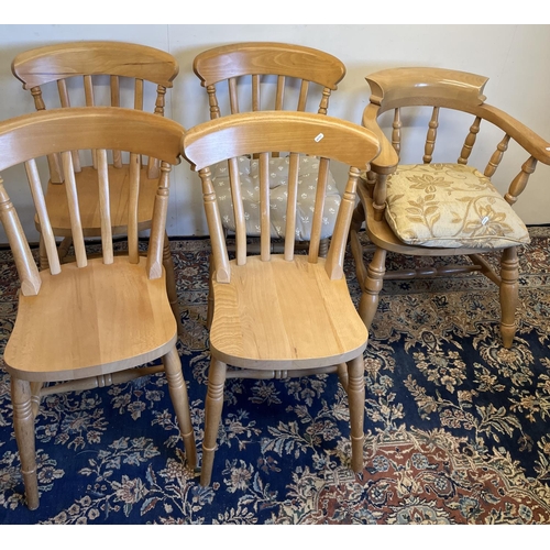 215 - Contemporary beech Smokers bow arm chair and a set of four Victorian style slat back kitchen chairs ... 