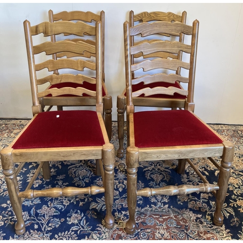 216 - Set of four Lancashire type ladderback dining chairs with upholstered seats on turned supports with ... 