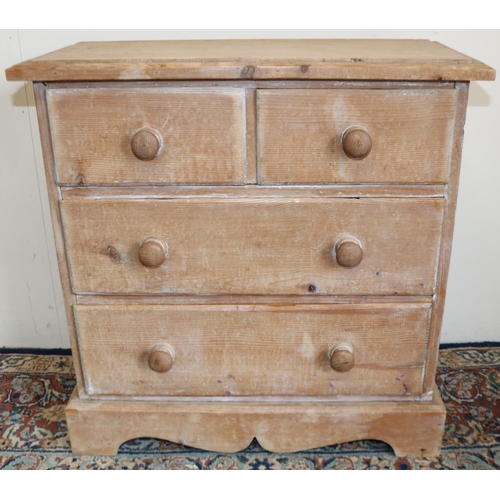 140 - Small pine chest of two short and two long drawers with turned handles on shaped skirted base, W60cm... 