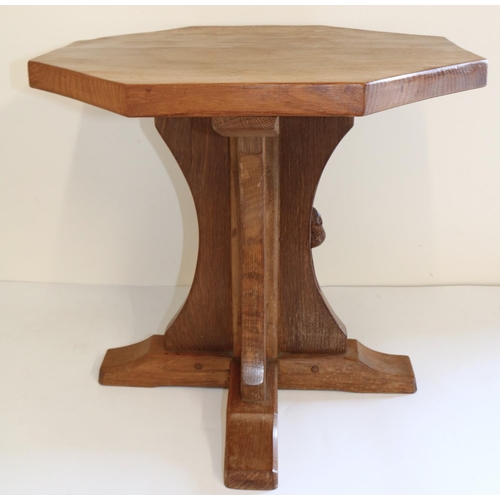 Robert Mouseman Thompson of Kilburn - an oak octagonal coffee table, adzed top on cruciform column support, H47cm W50cm