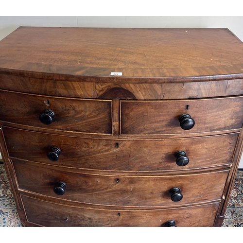 224 - Victorian bow front mahogany cheat of two short and three long drawers, with turned wooden handles a... 