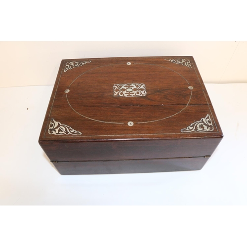 719 - Rosewood and inlaid mother of pearl writing box, and a collection of silver plate items incl. cutler... 