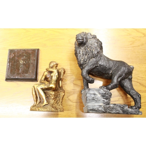 1041 - Carved stone Lion signed by artist, missing tail, and a brass sculpture of two lovers, signed by A. ... 