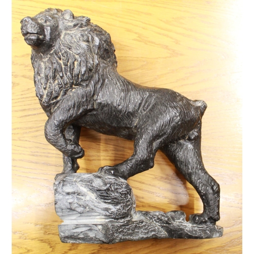 1041 - Carved stone Lion signed by artist, missing tail, and a brass sculpture of two lovers, signed by A. ... 