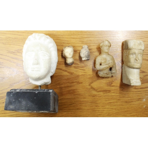 1044 - Small selection of soapstone figures and the head of a female goddess, in the Greco-Roman style