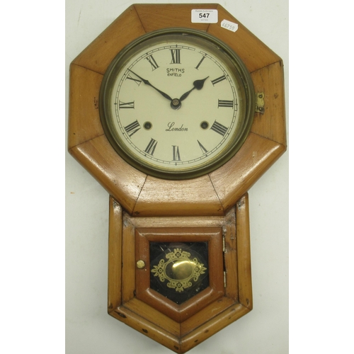 547 - American, early 20th century 8 day beech wall clock, brass bezel enclosing signed 7