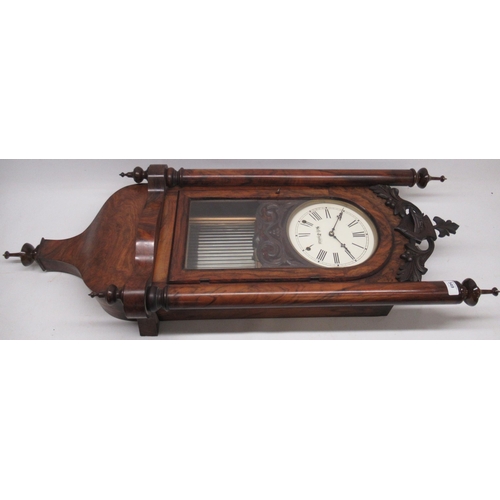 549 - Seth Thomas 8 day walnut wall clock, full length glazed panel door enclosing 8 1/4