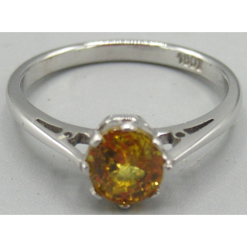 557 - 18ct white gold and yellow sapphire ring, size O.5, hallmarked .750.