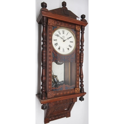 544 - New Haven Clock Co., 8 day oak wall clock, full length glazed door enclosing signed 7