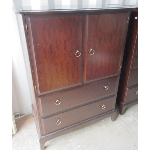 649 - Stag Minstrel tallboy, two doors above two drawers on bracket feet, W82cm D47cm H112cm and a single ... 