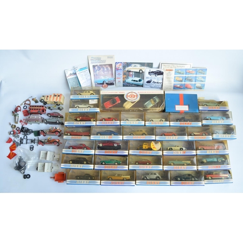 399 - Collection of boxed diecast car models from Dinky, most attached to bases and generally in mint cond... 