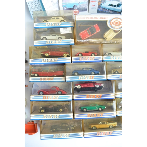 399 - Collection of boxed diecast car models from Dinky, most attached to bases and generally in mint cond... 