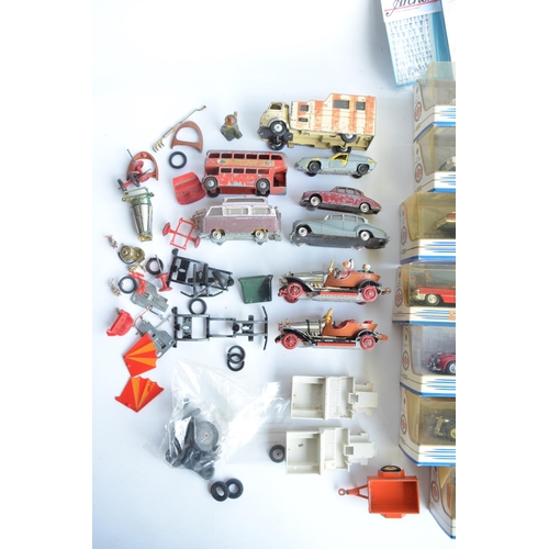 399 - Collection of boxed diecast car models from Dinky, most attached to bases and generally in mint cond... 