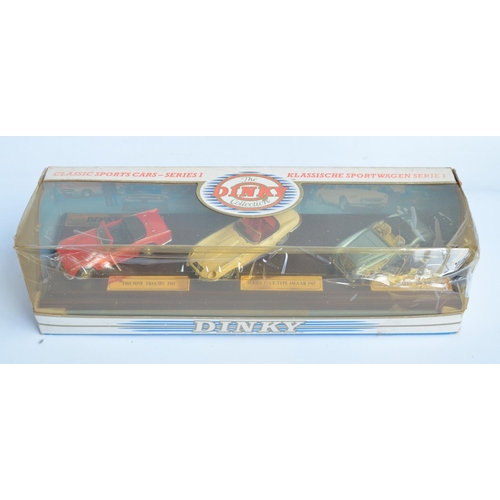 399 - Collection of boxed diecast car models from Dinky, most attached to bases and generally in mint cond... 