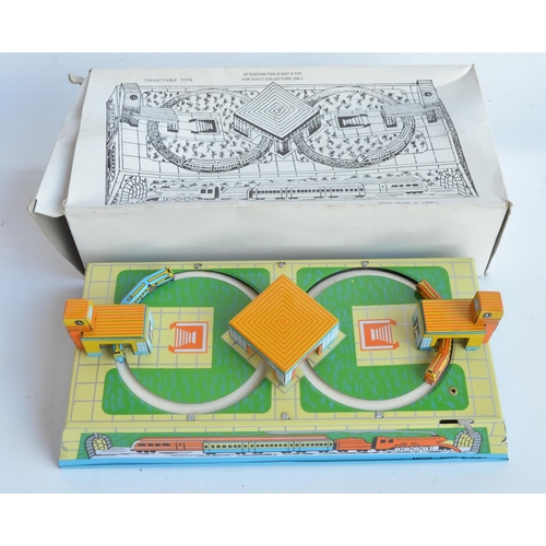 405 - Collection of tin plate clockwork and friction powered models to include Corgi/Mettoy 50th anniversa... 