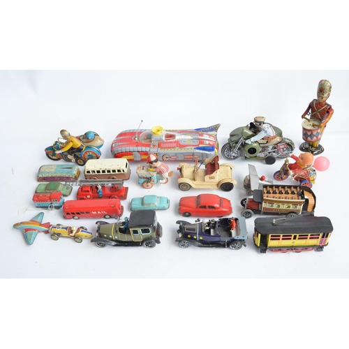 407 - Collection of 22 modern and vintage unboxed tin plate clockwork, friction, free running and battery ... 