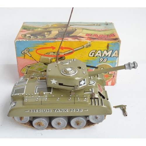 409 - Vintage boxed tinplate Gama 98 clockwork tank (damaged with detached/loose front machine gun, good o... 