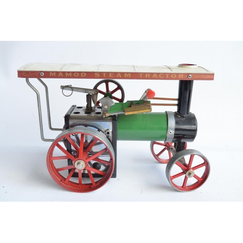 414 - Two Mamod live steam engines to include TE1A traction engine and an SE2 stationary engine, both in g... 