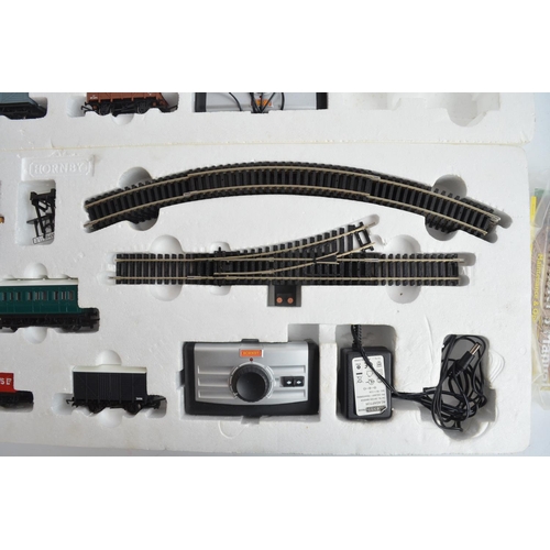 424 - Two boxed OO gauge Hornby train sets to include R1142 Western Messenger (set appears in excellent co... 