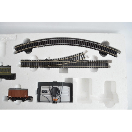 424 - Two boxed OO gauge Hornby train sets to include R1142 Western Messenger (set appears in excellent co... 