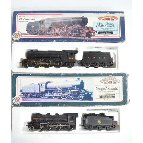 425 - Nine boxed OO gauge electric steam train models from Bachmann to include limited edition Green Arrow... 