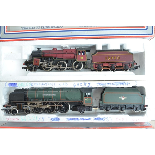 426 - Eleven boxed previously run OO gauge electric steam train models from Lima, model generally in poor ... 