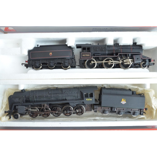 426 - Eleven boxed previously run OO gauge electric steam train models from Lima, model generally in poor ... 