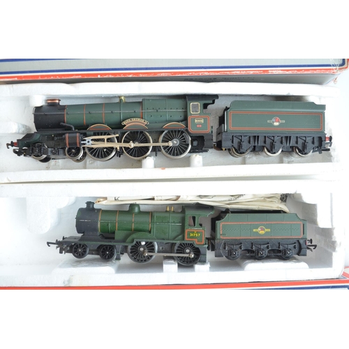 426 - Eleven boxed previously run OO gauge electric steam train models from Lima, model generally in poor ... 