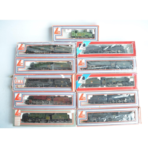 426 - Eleven boxed previously run OO gauge electric steam train models from Lima, model generally in poor ... 