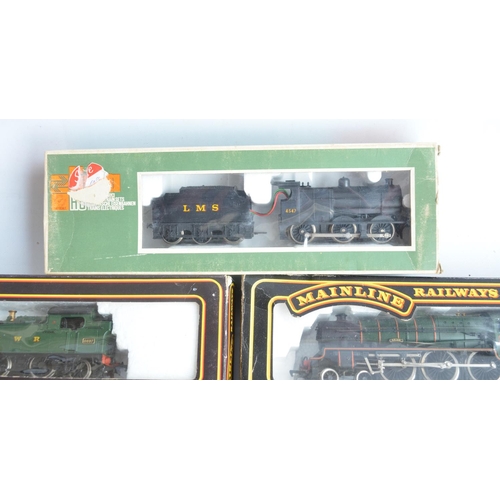 428 - Eleven boxed OO gauge electric steam train models from Replica Railways, Lima, Grafar and Mainline t... 