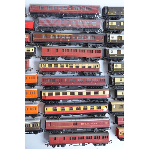 438 - Fifty three unboxed previously used OO/HO gauge passenger coaches, mail wagons, Pullman coaches etc.... 