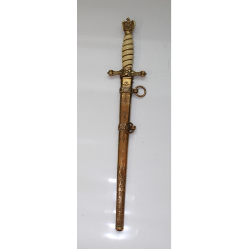 1562 - WWII German Navy Kriegsmarine dress dagger. This example has the bolt of lightning design to scabbar... 