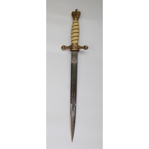 1562 - WWII German Navy Kriegsmarine dress dagger. This example has the bolt of lightning design to scabbar... 