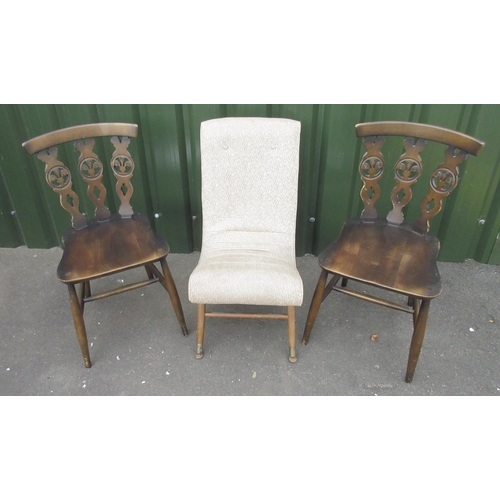 270 - Pair of Ercol dining chairs with Fleur de Lys splats and a 1960's low easy chair, (3)