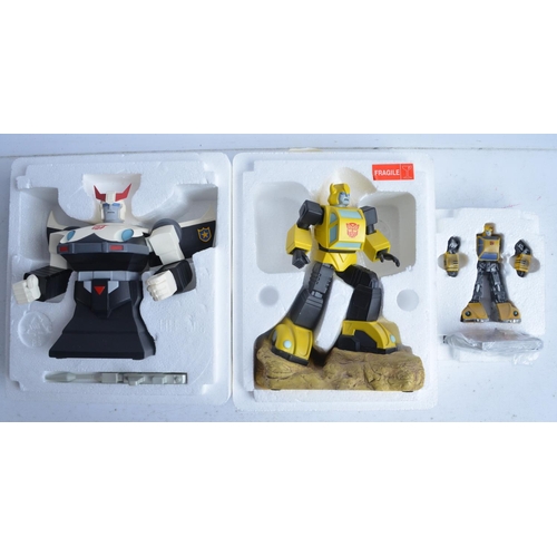 181 - Three limited edition Transformer statues to include Hard Hero cold cast porcelain 6