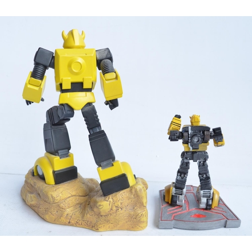 181 - Three limited edition Transformer statues to include Hard Hero cold cast porcelain 6