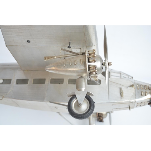 444 - Large museum standard Ford Trimotor static model aircraft model with solid polished metal stand by A... 