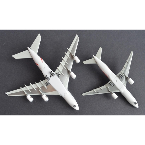 463 - Seventeen boxed 1/400 diecast international airlines themed civilian airliner models including highl... 