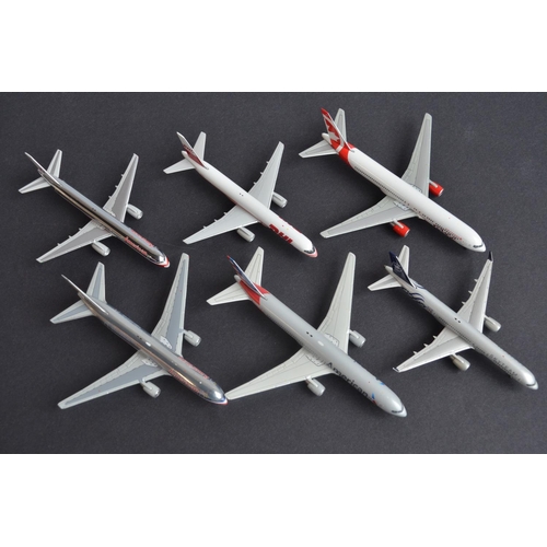 463 - Seventeen boxed 1/400 diecast international airlines themed civilian airliner models including highl... 