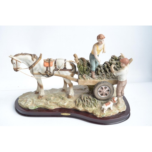 376A - Collection of ceramic tractor and farm related diorama based sculptures and a metal green tractor mo... 