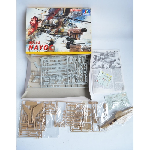 469 - Collection of plastic model kits from Tamiya and Italeri to include Italeri/Dragon 1/72nd scale MI-2... 