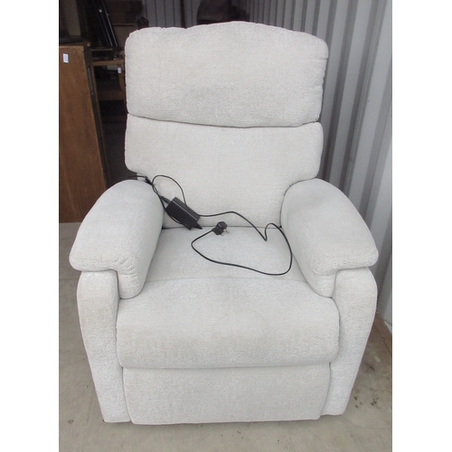 282 - Electric rise and recline arm chair, upholstered in cream