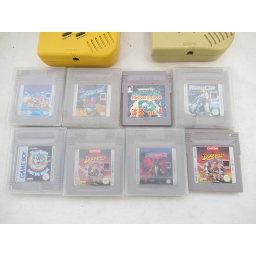 291A - Yellow and Grey Nintendo Gameboys (1 working the other not) with 8 game cartridges