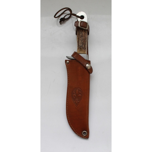 1602 - Tonerini Italian Hunting knife. Full tang with two piece antler grip and alloy guard and pommel. Thr... 